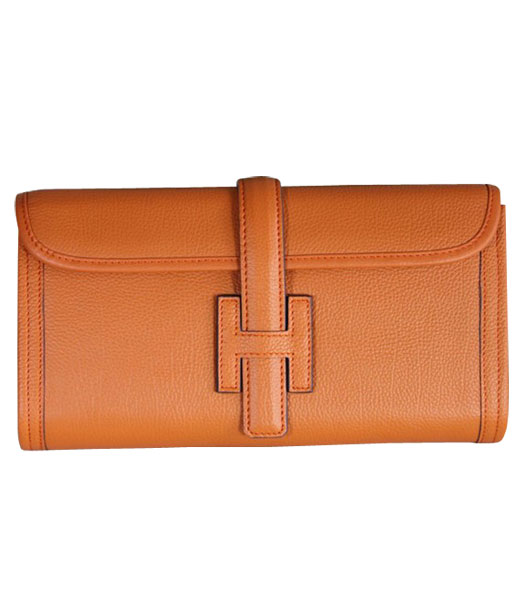 Hermes Bovine Jugular Veins Clutch Bag in Orange Leather